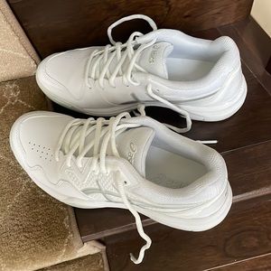 Practically brand new Asics running sneakers. Pristine condition.